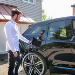 eaton-xstorage-hybrid-man-charging-ev-at-home-getty