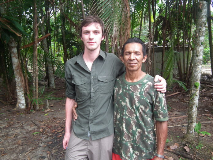 Jan-Christian Gibson při práci v terénu. Chief José of the local New Hope village of the Baré people Amazon, Brazil
